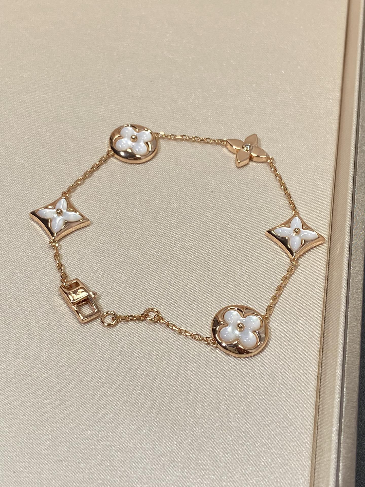 [Glow Muse]STAR AND SUN 5 MOTIF MOP PINK GOLD BRACELET